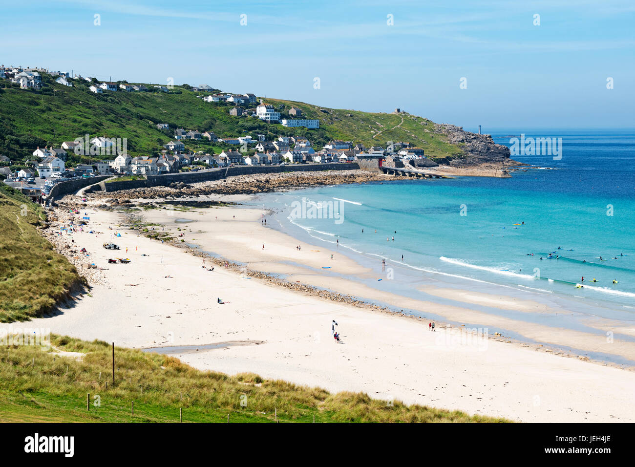 the white sandy beach and blue water at sennen cove near lands end in cornwall, england, britain, uk. Stock Photo
