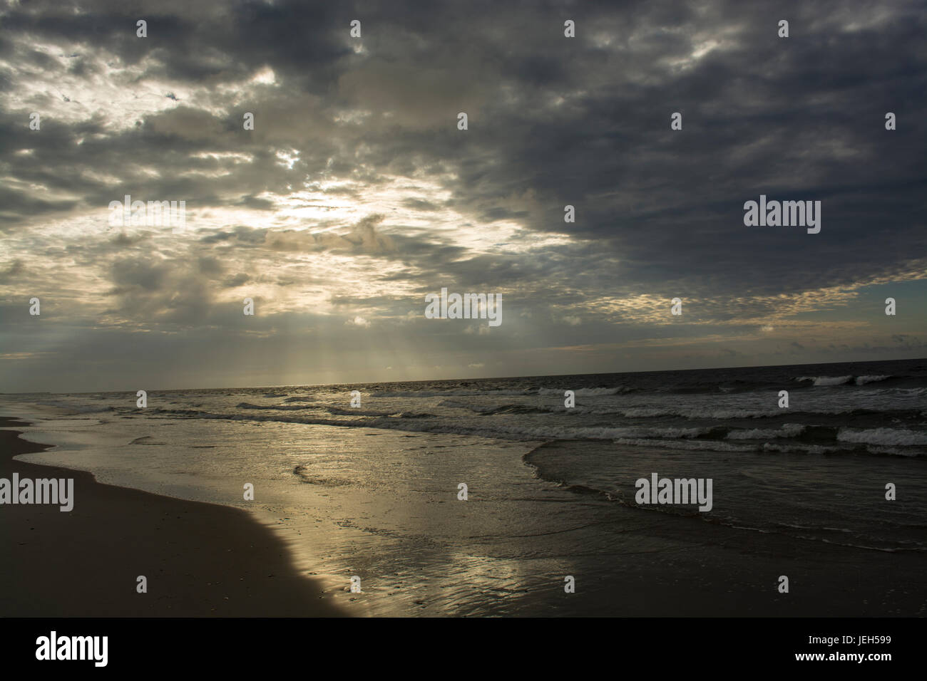 Sunrise on the beach Stock Photo