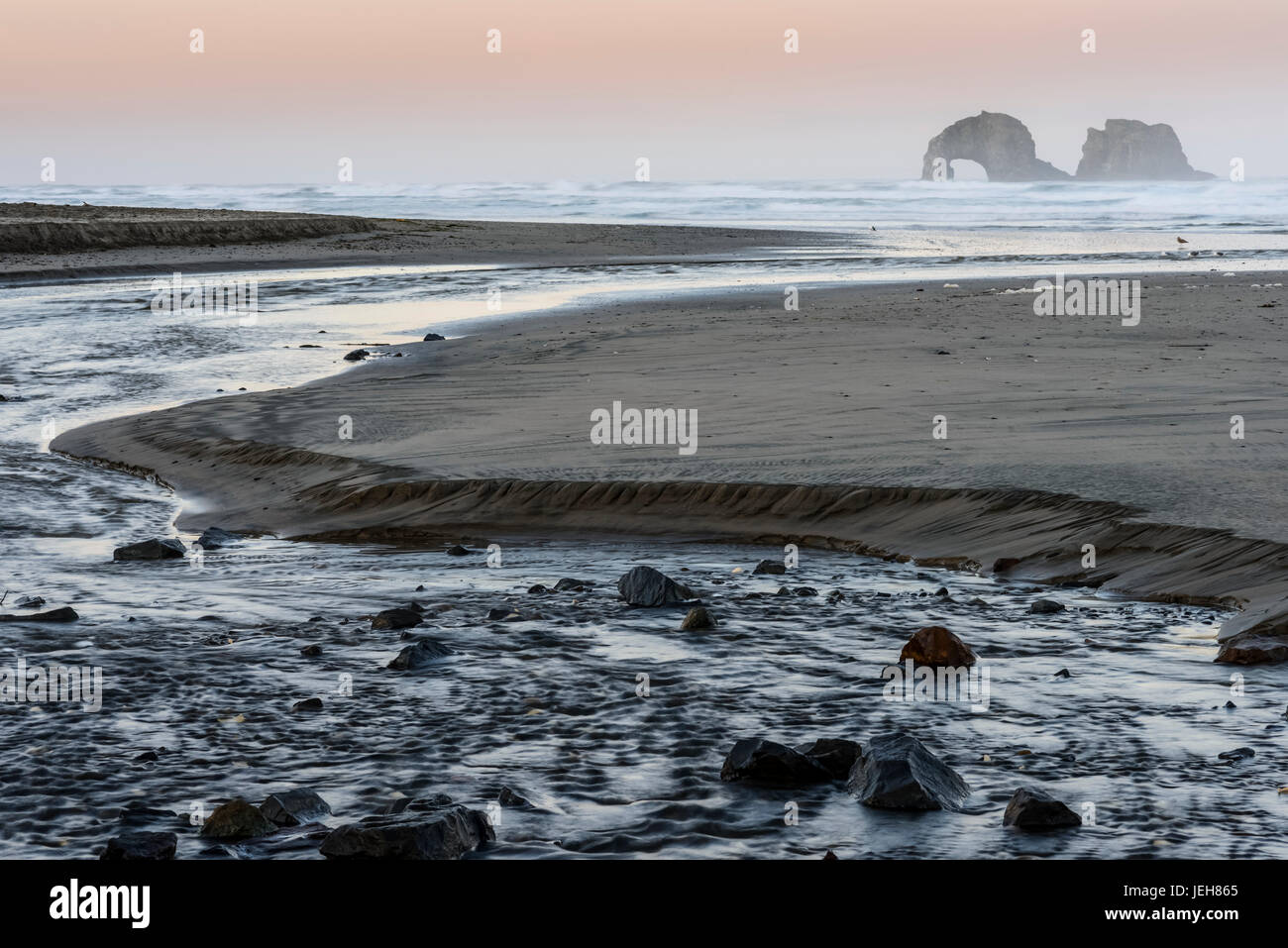 Morning comes to Rockaway Beach; Rockaway Beach, Oregon, United States of America Stock Photo