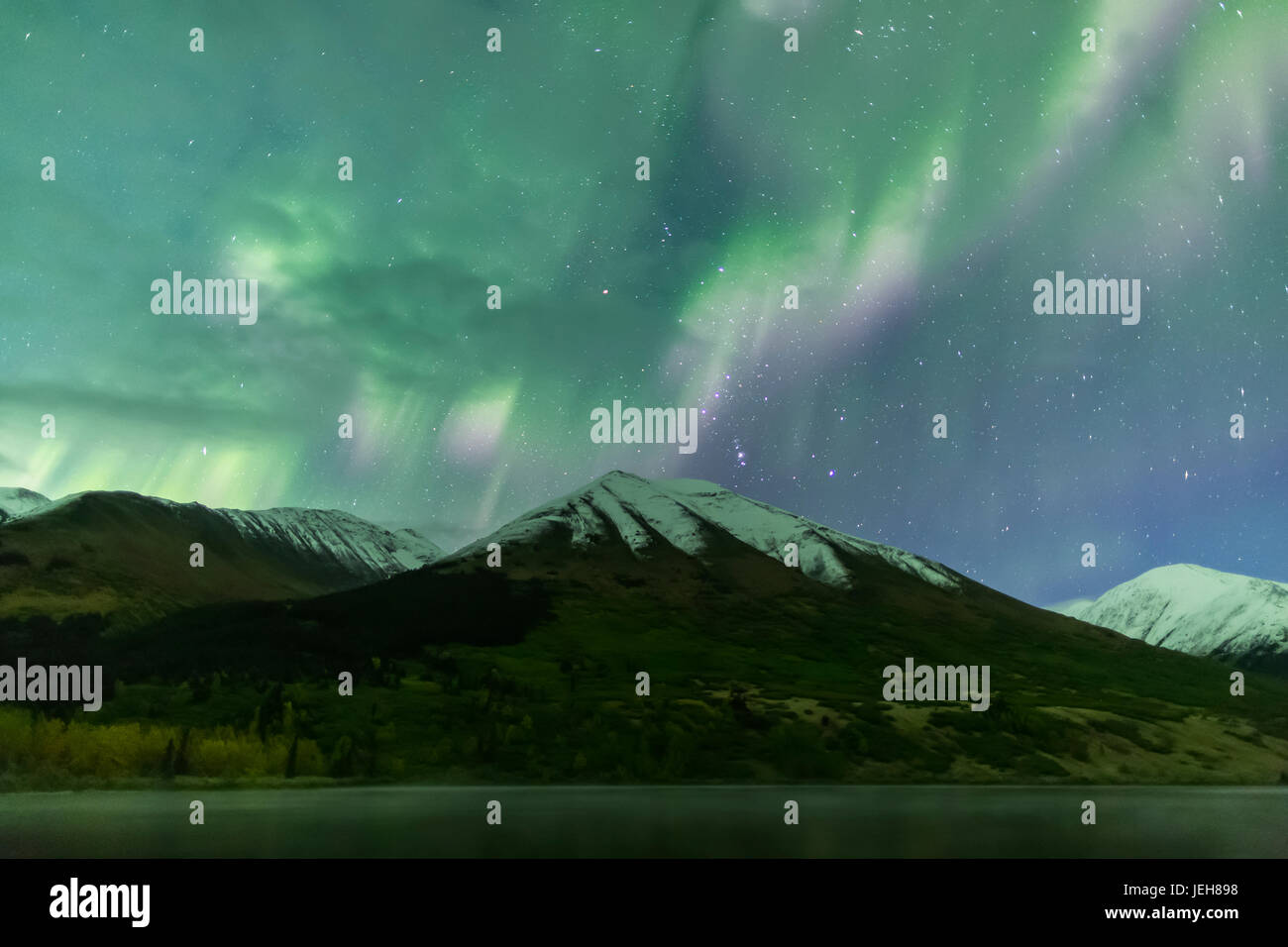 Bright Green Aurora Borealis Dances Over The Kenai Mountains, Summit