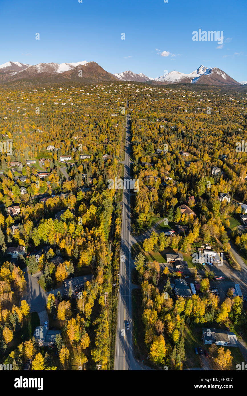 Aerial View Of The Hillside Neighbourhood Homes In Anchorage, Snow