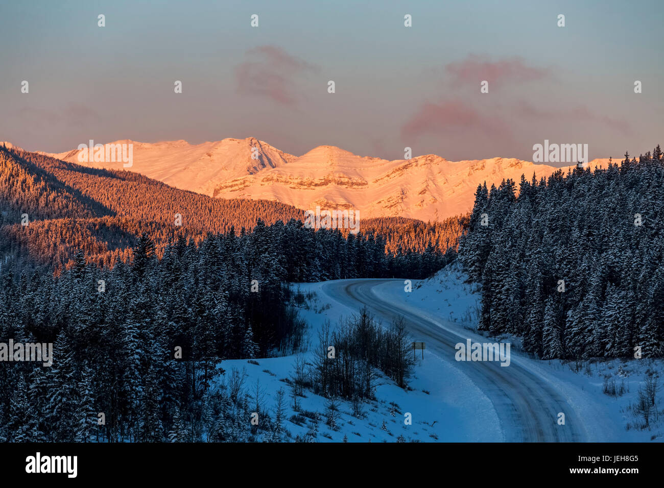 Snow covered winter landscape at sunrise hi-res stock photography and ...