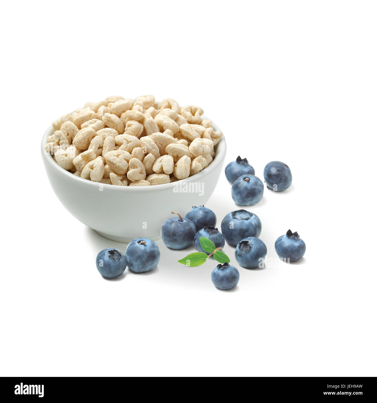 Puff snacks and blueberries on a white background Stock Photo Alamy