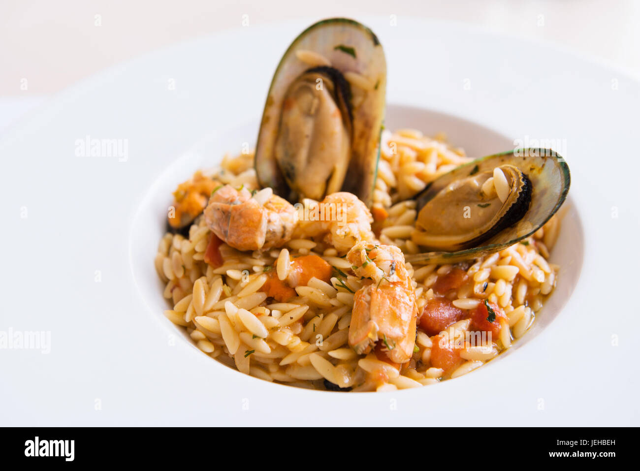 Muscles Risotto Risotto with mussels and shrimps Stock Photo - Alamy
