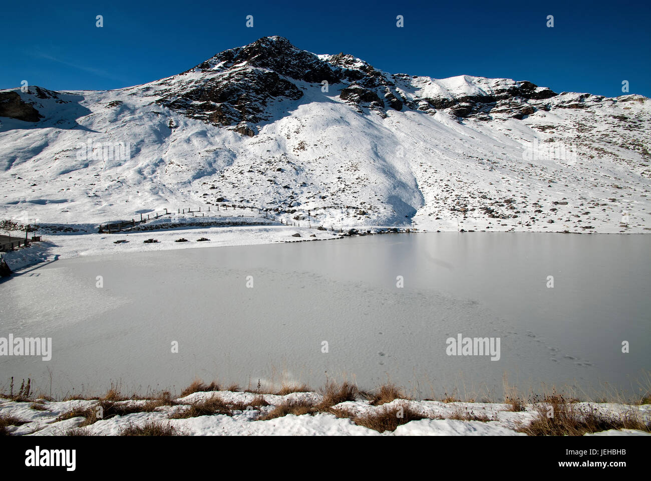 Frozen lake in the mountains Stock Photo
