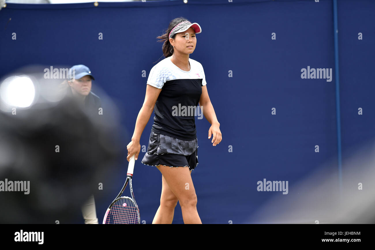 Risa Ozaki of Japan in action against Varvara Lepchenko of the USA during the Aegon International Eastbourne tennis tournament at Devonshire Park in Eastbourne East Sussex UK. 25 Jun 2017 Stock Photo