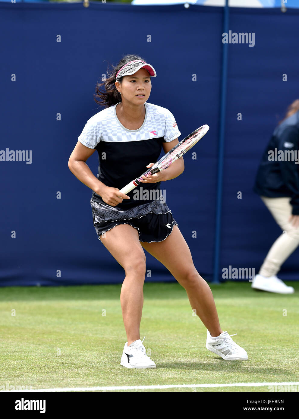 Risa Ozaki of Japan in action against Varvara Lepchenko of the USA during the Aegon International Eastbourne tennis tournament at Devonshire Park in Eastbourne East Sussex UK. 25 Jun 2017 Stock Photo