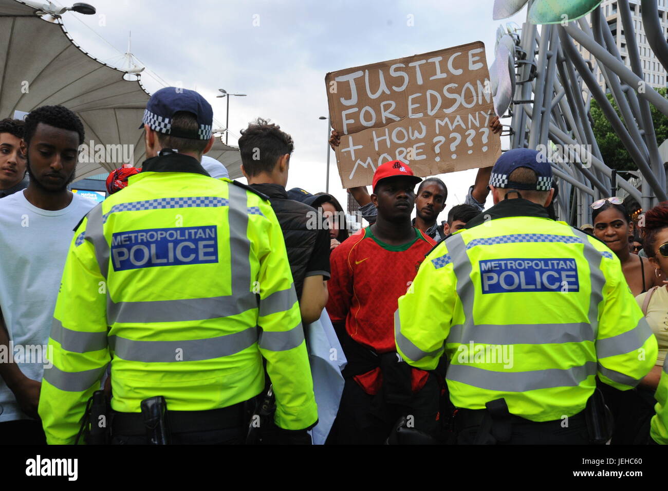 Campaigners face off with police as they protest over the death of Edir Frederico Da Costa, who died on June 21 six days after he was stopped in a car by Metropolitan Police officers in Woodcocks, Beckton, in Newham, east London. Stock Photo