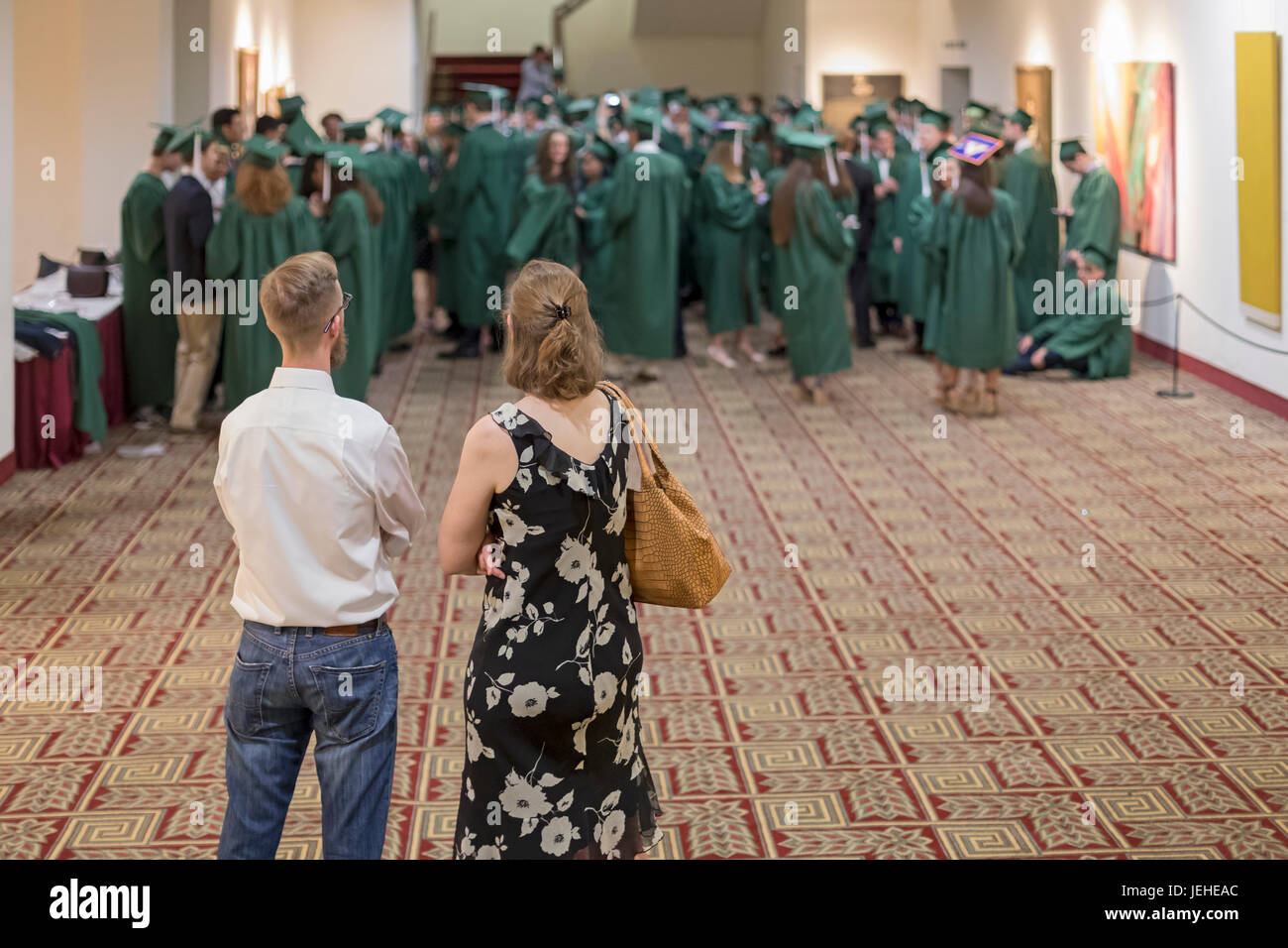 Washington, DC - Parents watch as students get ready for their graduation ceremony at Georgetown Day School. Stock Photo