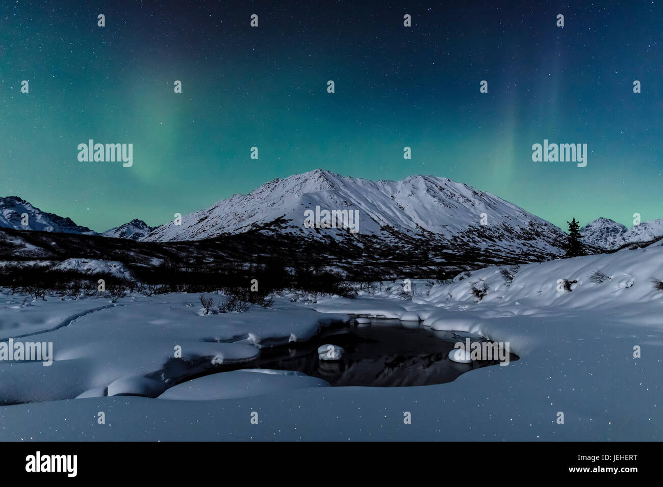 Aurora Borealis (Northern Lights) dance above Idaho Peak and the Little