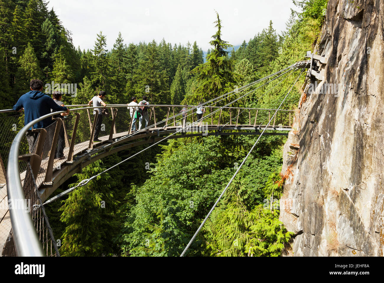 Curved suspension bridge hi-res stock photography and images - Alamy