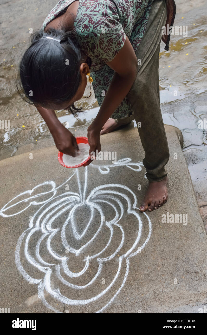 Girl Doing Kolam Images