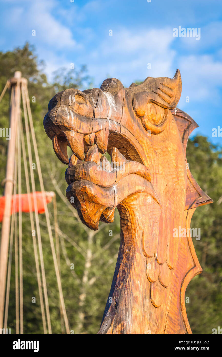 The wooden figure of a dragon's head on the prow of an ancient ship Stock  Photo - Alamy