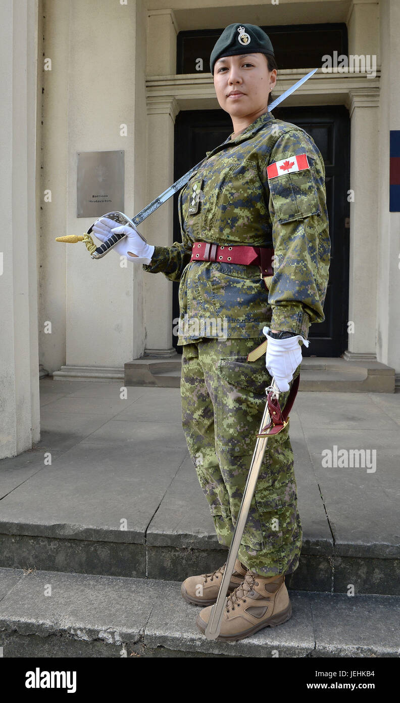 Captain Megan Couto of the 2nd Battalion, Princess Patricia's Canadian Light Infantry (PPCLI), makes history as she becomes the first woman to command the Queen's Guard at Wellington Barracks, London. Stock Photo