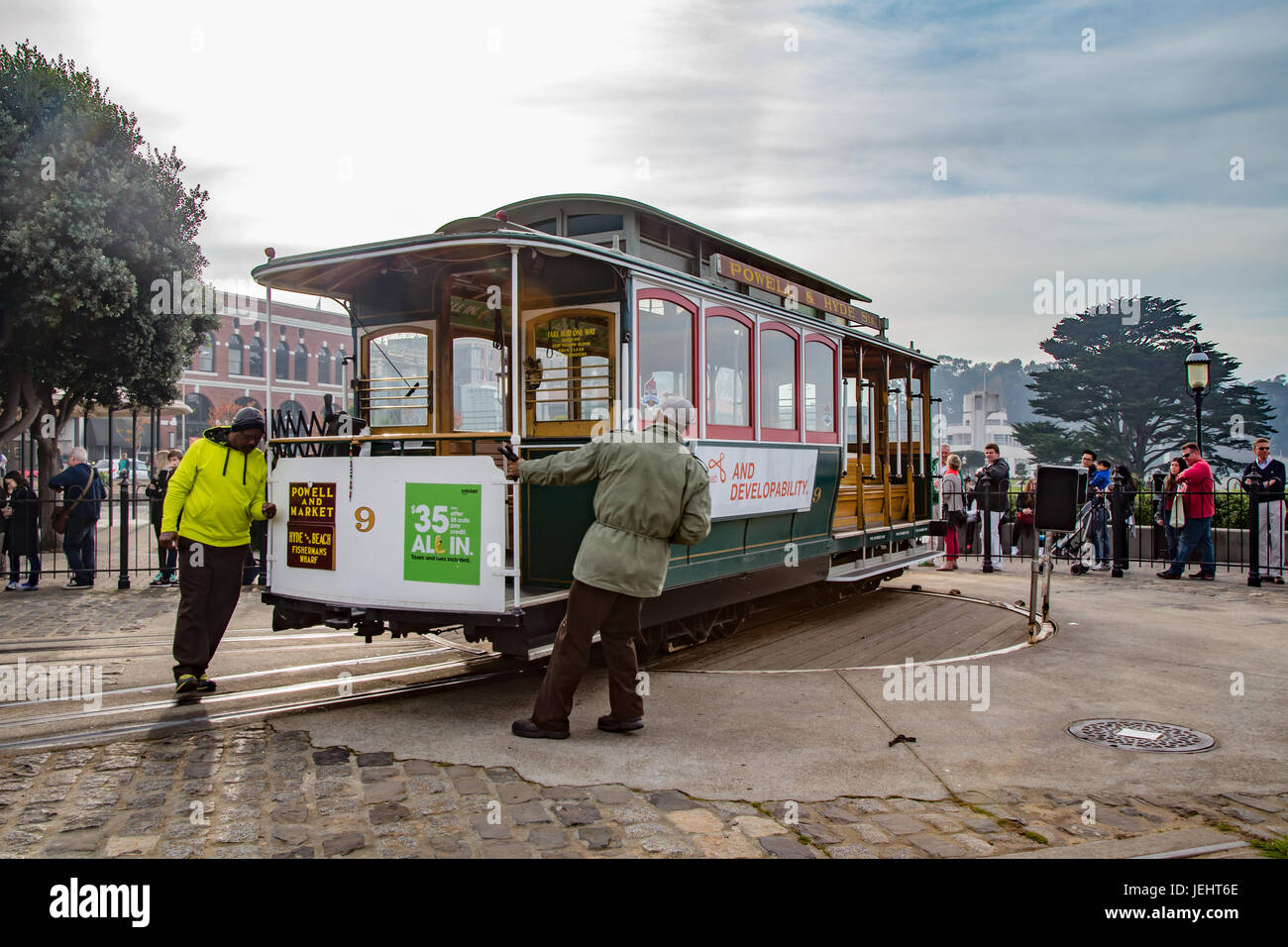 San Francisco, USA - January 8, 2015:  Cable car being turned around on a turning point. Stock Photo