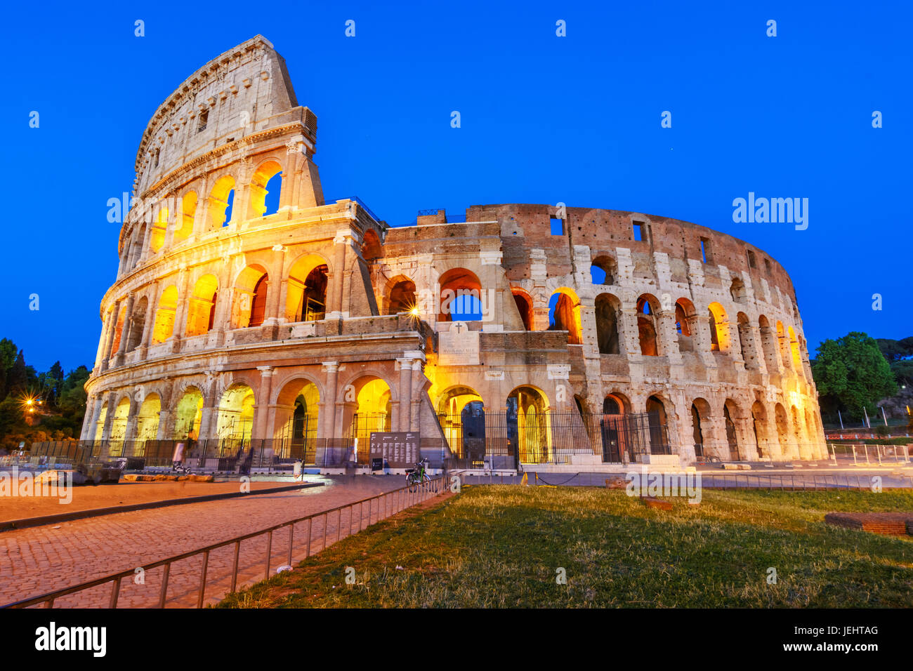 Night view of the Colosseum, an elliptical amphitheatre in the centre