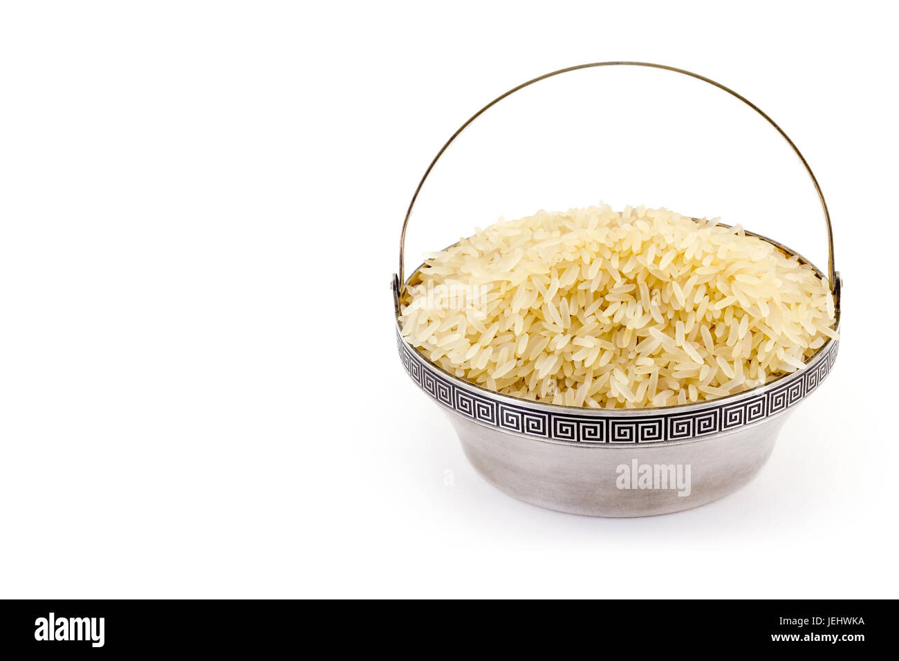 Rice in a bowl on a white background Stock Photo