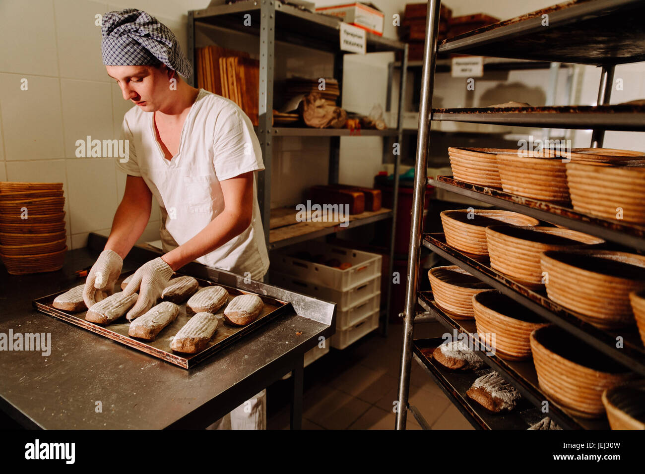 male cook shaping dough for baking bread Stock Photo Alamy