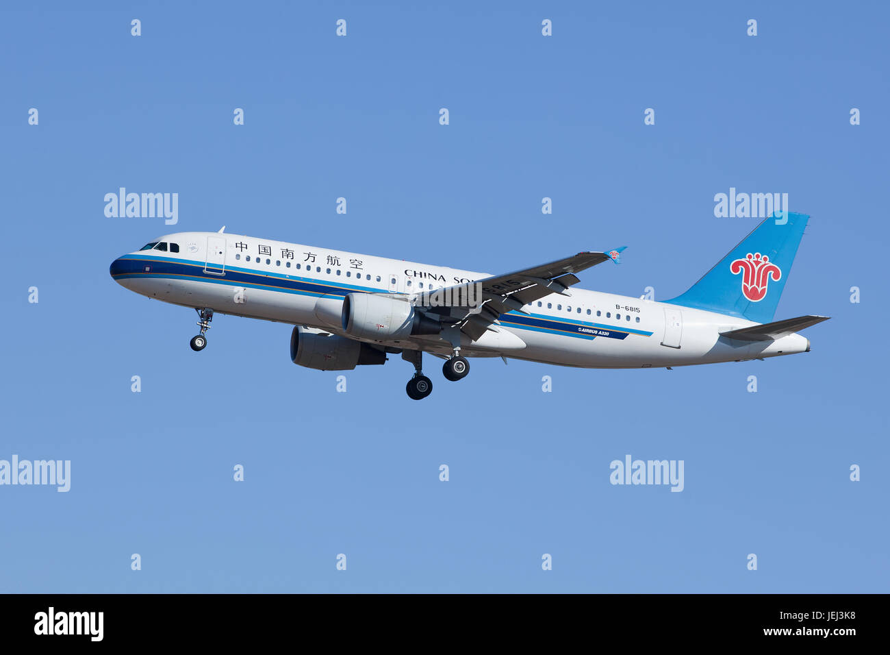 BEIJING-FEBRUARY 18, 2015. Southern Airlines B-6815 Airbus A320 landing in Beijing. A total of 5,677 Airbus A320 family aircraft have been delivered. Stock Photo
