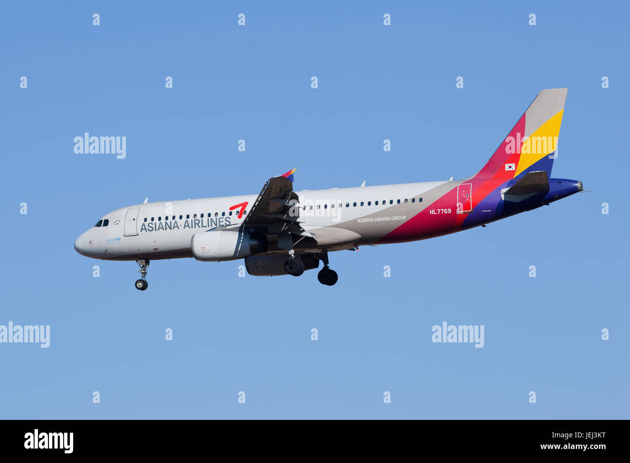 BEIJING-FEBRUARY 18, 2015. Asiana Airlines HL7769, Airbus A320-200 is landing. The Airbus A320 is a two-engine short- to medium-range narrow body airl Stock Photo