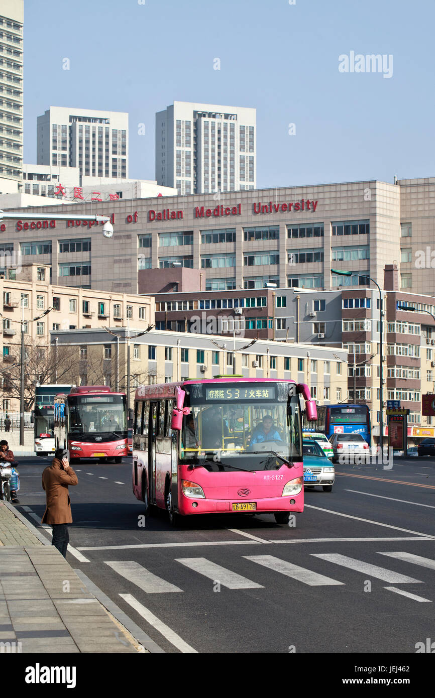 DALIAN-NOV. 27. Buses on the road. Public bus transport in Dalian is highly developed. Over 150 bus routes enable travelers to get around the city. Stock Photo