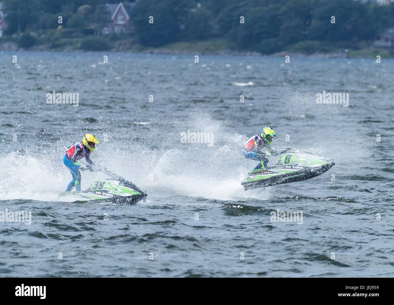 The P1 Scottish Grand Prix of the Sea is the second of four events across the UK for the P1 Powerboat Championship taking place at Greenock.  Pictured: Lucy Gadsby (No 8) and Emma Gadsby (No. 38) in the AquaX Sprint Race Stock Photo