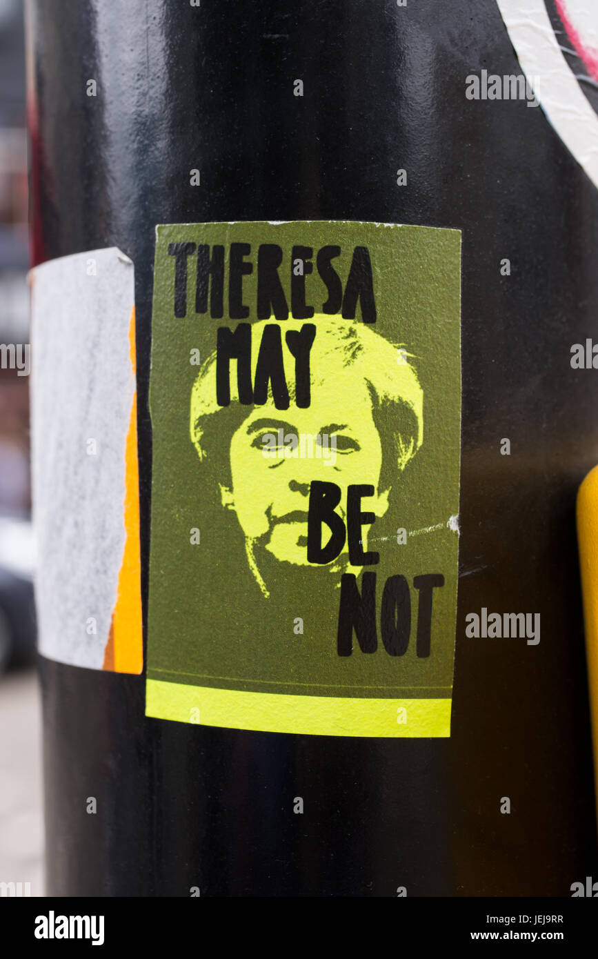 Shoreditch, London, UK. 25th June, 2017. Theresa May Be Not written on a sticker above the prime minister portrait. Part of a protest campaign against the British prime minister who is struggling to keep a coalition together. Credit: Nicola Ferrari/Alamy Live News Stock Photo