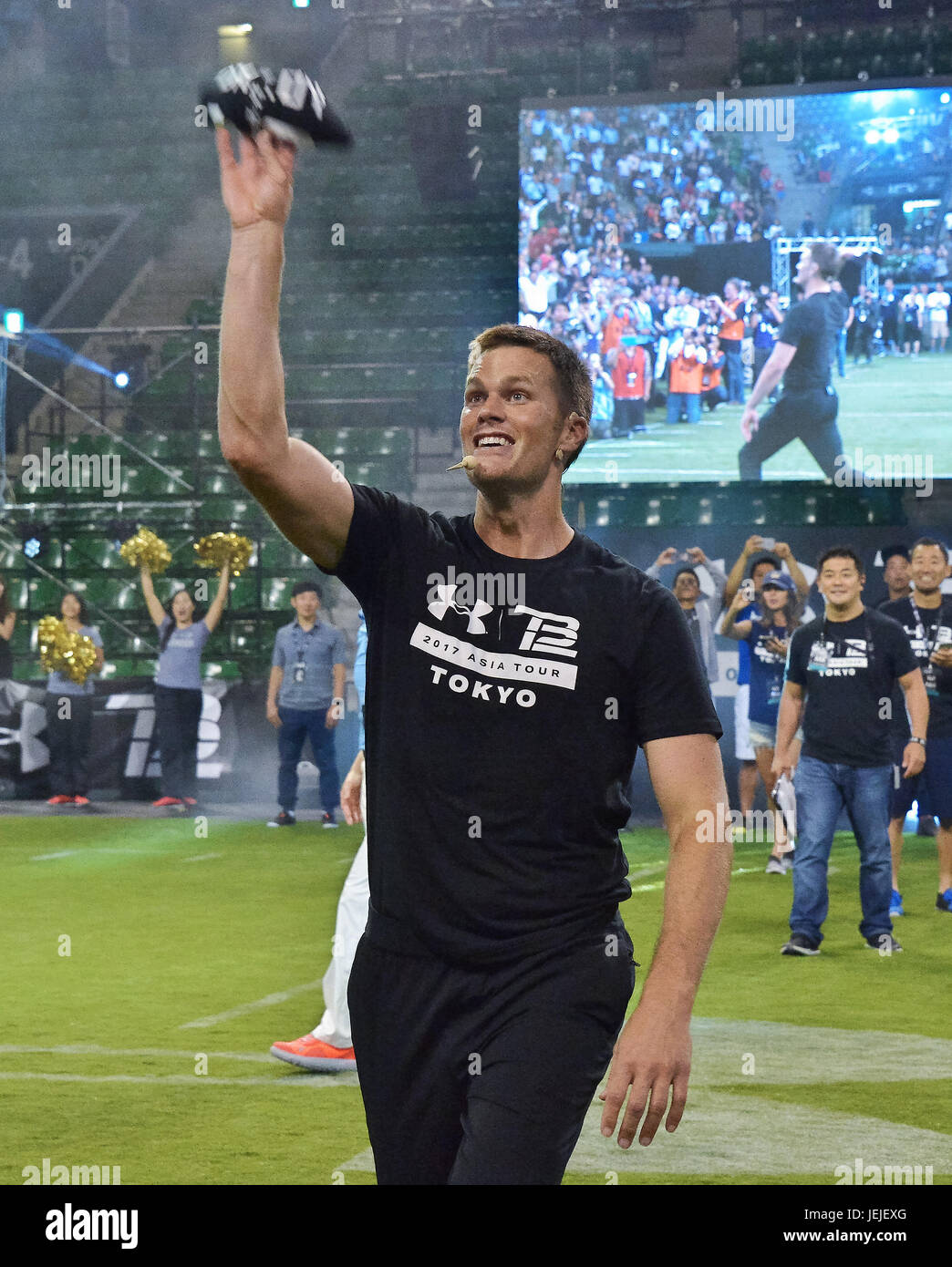Tom Brady, UNDER ARMOUR, June 21, 2017, Tokyo, Japan : New England Patriots  quarterback Tom Brady gives instructions to young players during a football  clinic in Tokyo, Japan on June 21, 2017.