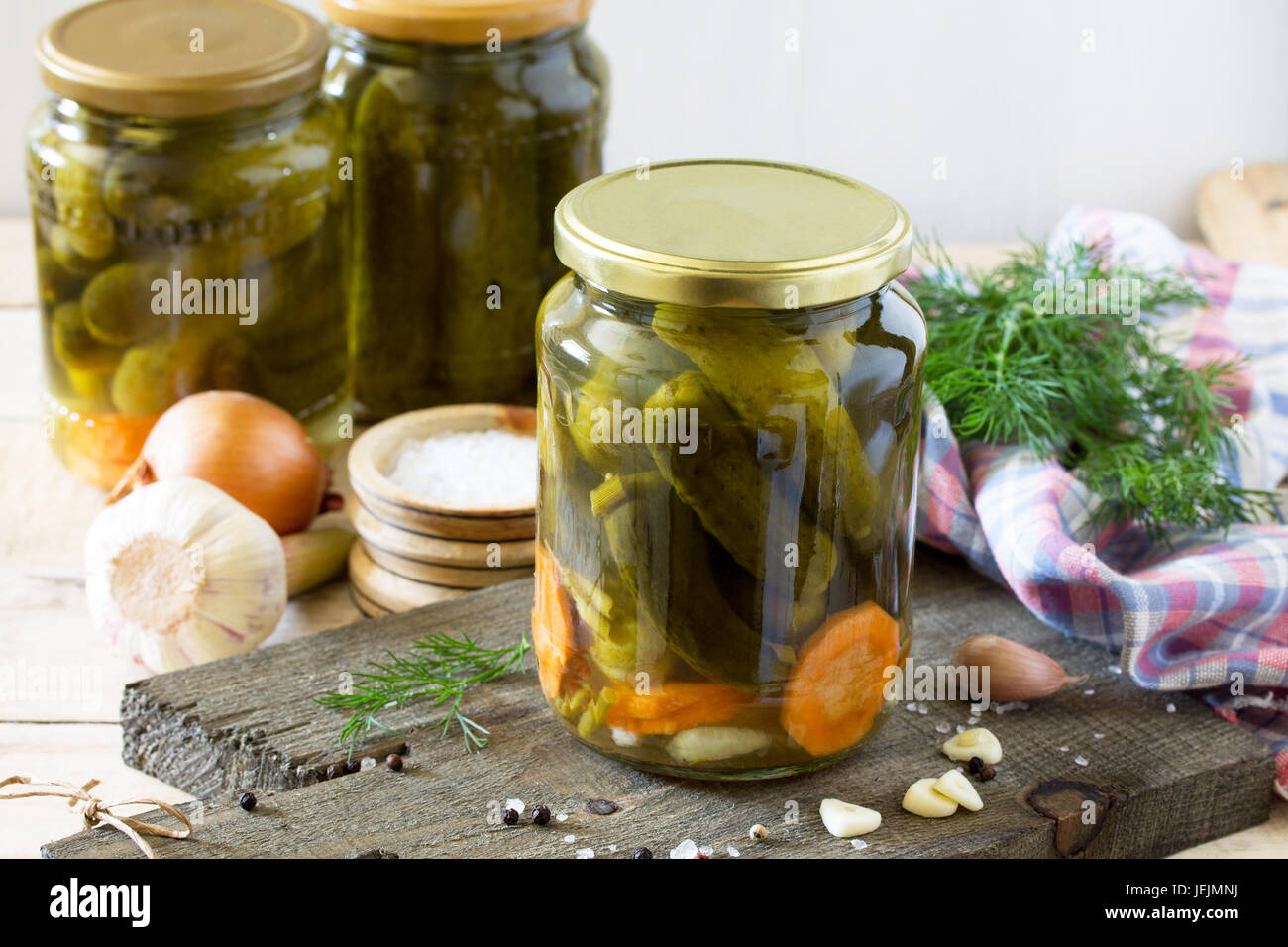 Marinated cucumbers gherkins. Marinated pickles with garlic on the