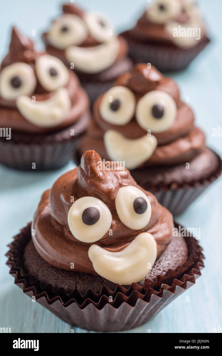 Funny poop emoji chocolate cupcakes. Cute food dessert Stock Photo - Alamy Funny poop emoji chocolate cupcakes. Cute food dessert Stock Photo - Alamy