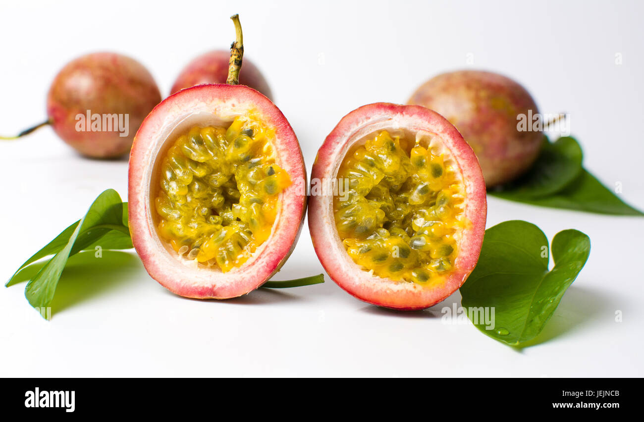 Open passion fruit isolated on white background Stock Photo Alamy