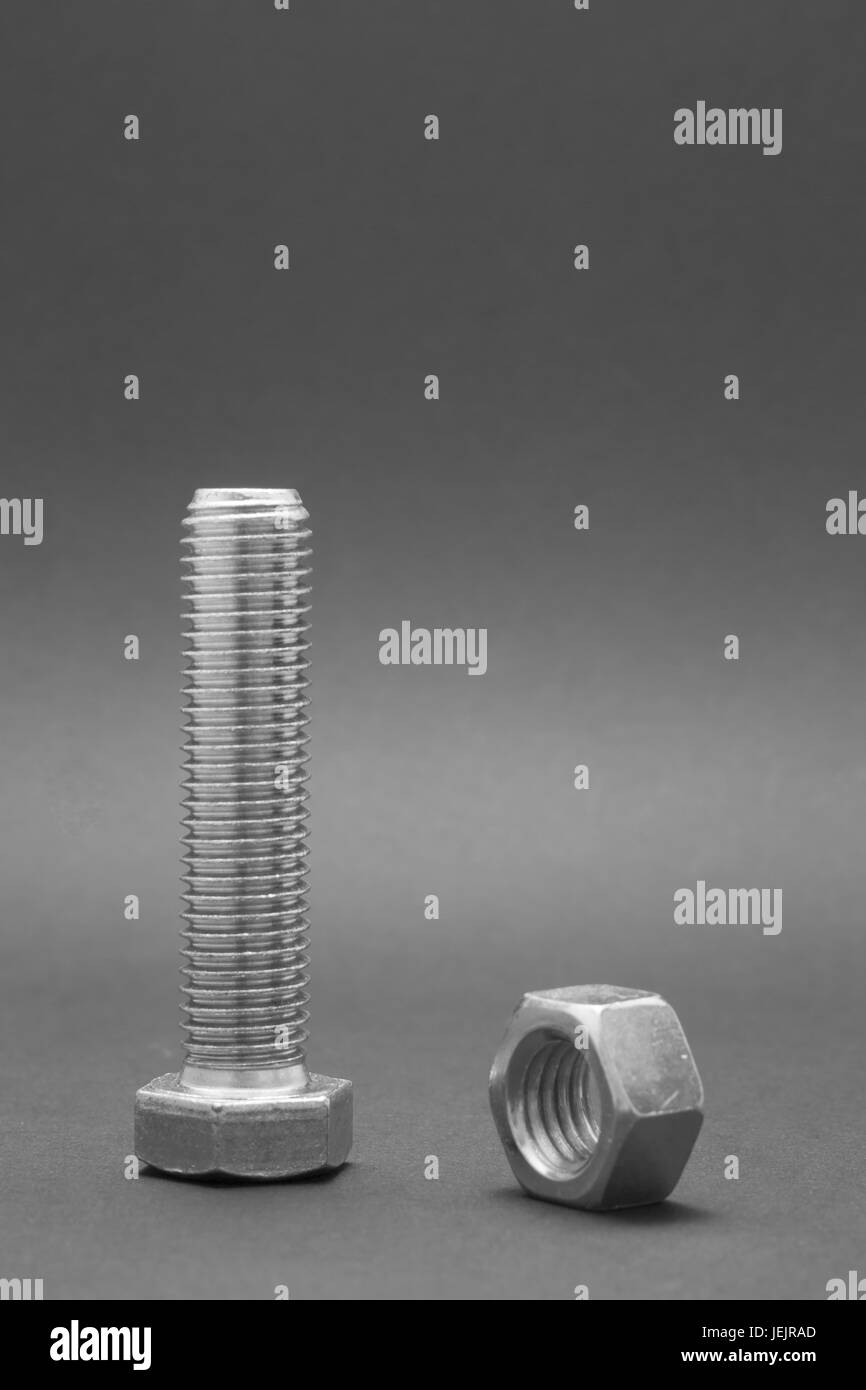 Screw bolts and nuts on black background Stock Photo Alamy
