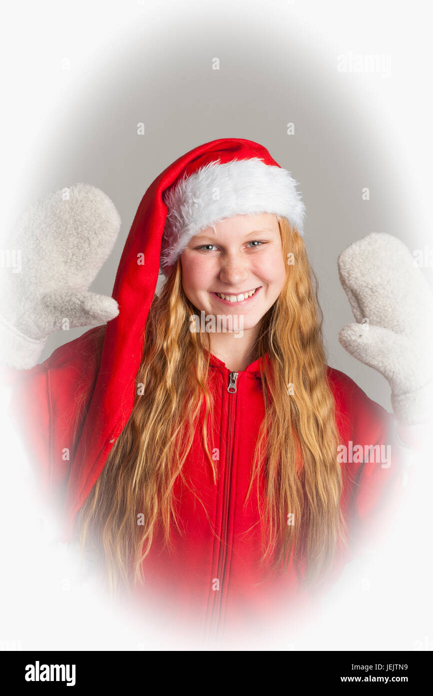 Girl wearing santa hat hi-res stock photography and images - Alamy