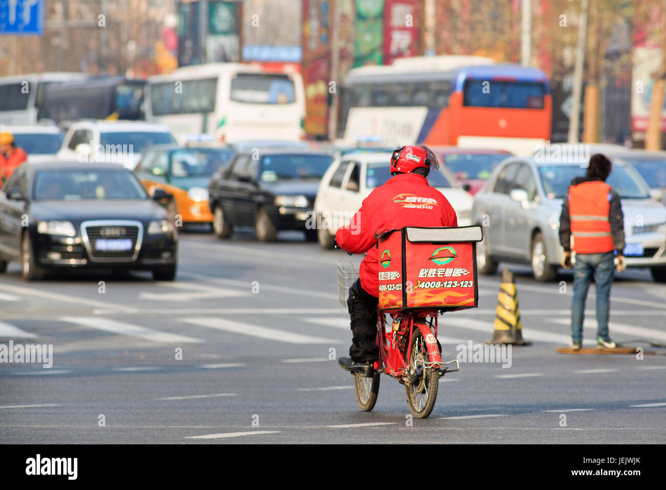 BEIJING-DEC. 4. Pizza Hut delivery. It was the first chain to introduce pizza and Western-style casual dining to China in 1990. Stock Photo