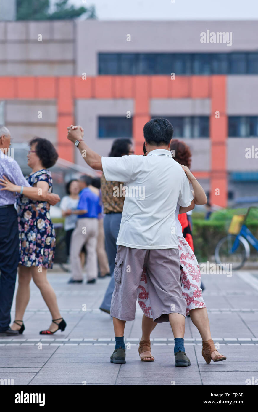 BEIJING-JULY 10, 2015. Collective square dancing is a very popular phenomenon in China and for many people a sort of recreation. Stock Photo