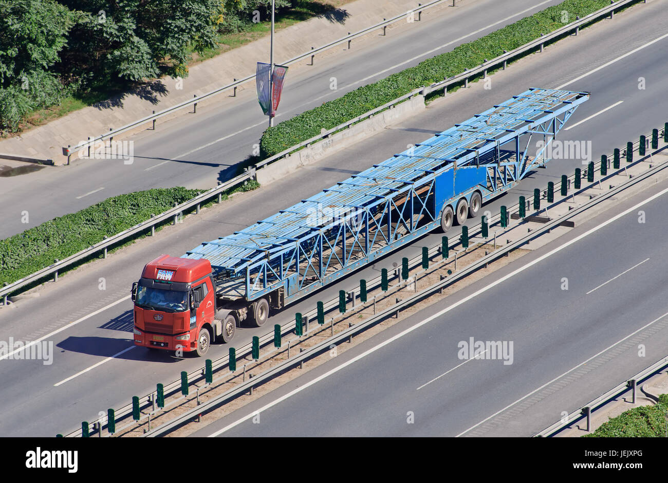 BEIJINGJUNE 30, 2015. Oversized car carrier. These illegal car