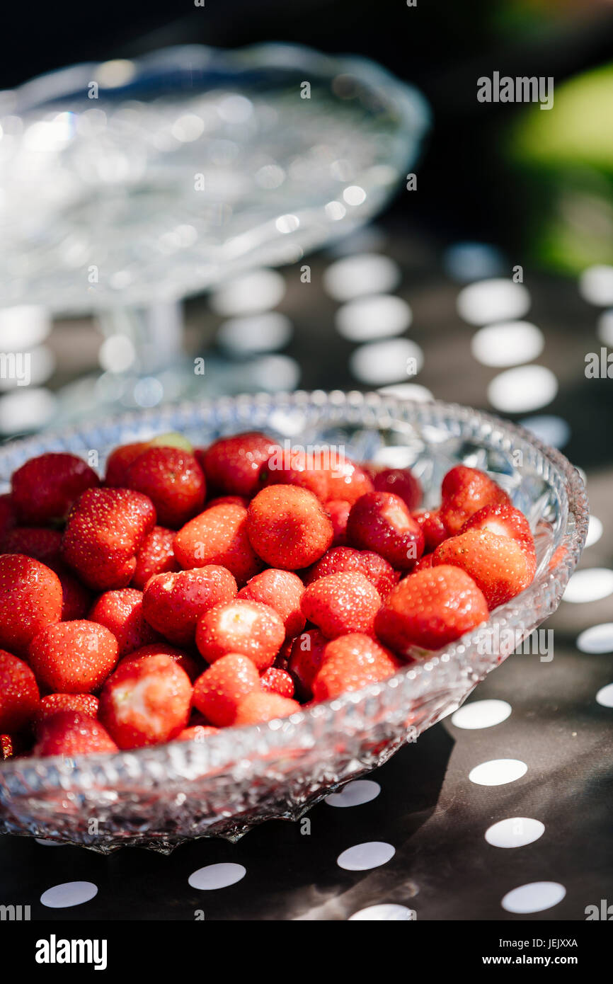 Strawberries in crystal bowl hi-res stock photography and images - Alamy