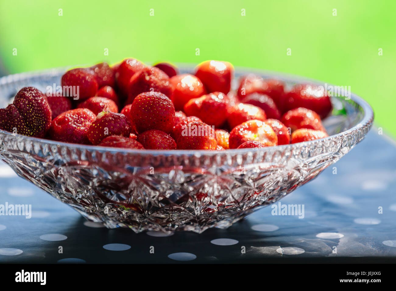 Strawberries in crystal bowl hi-res stock photography and images - Alamy