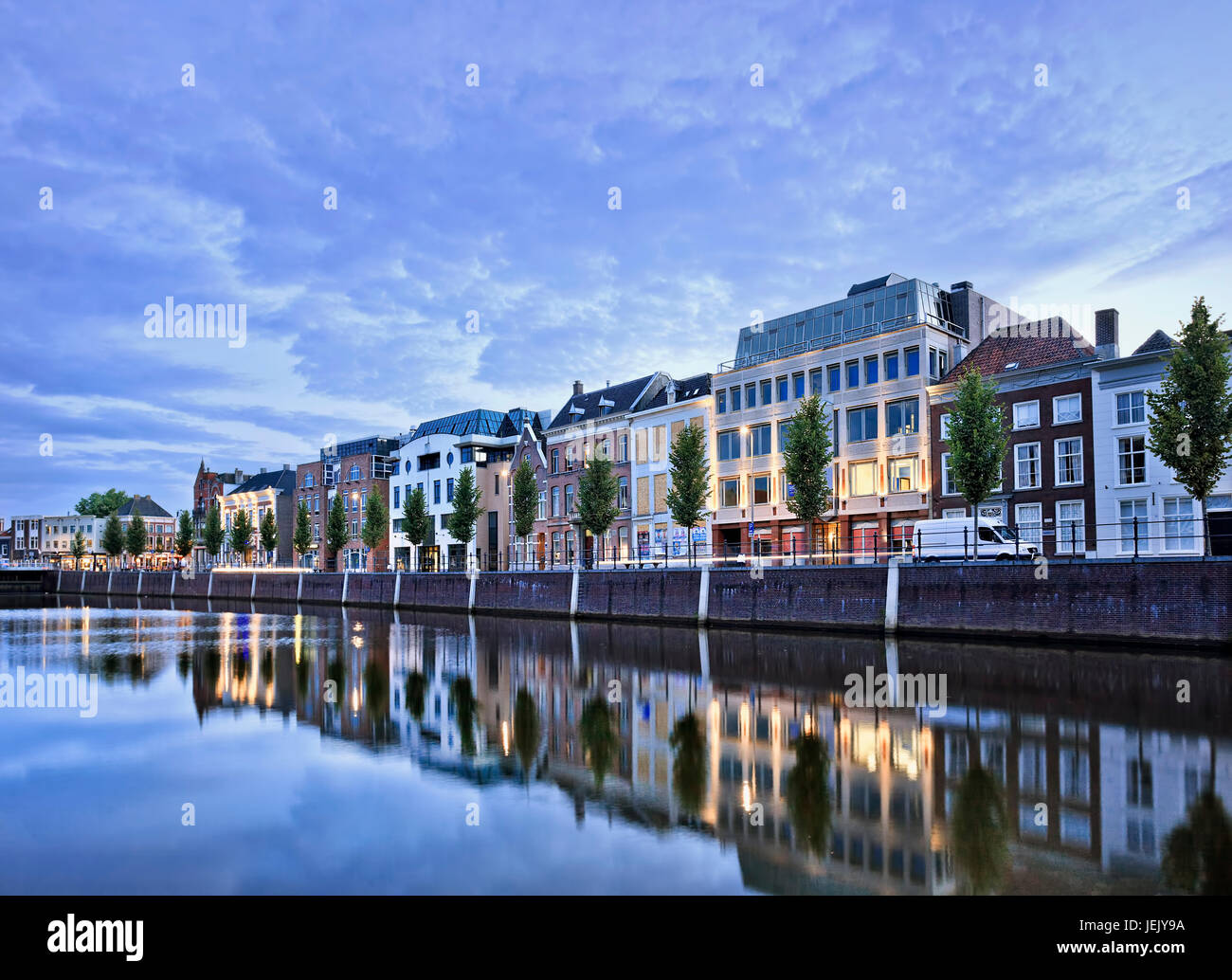 Stately mansions mirrored in a harbor at twilight, Breda, The Netherlands Stock Photo