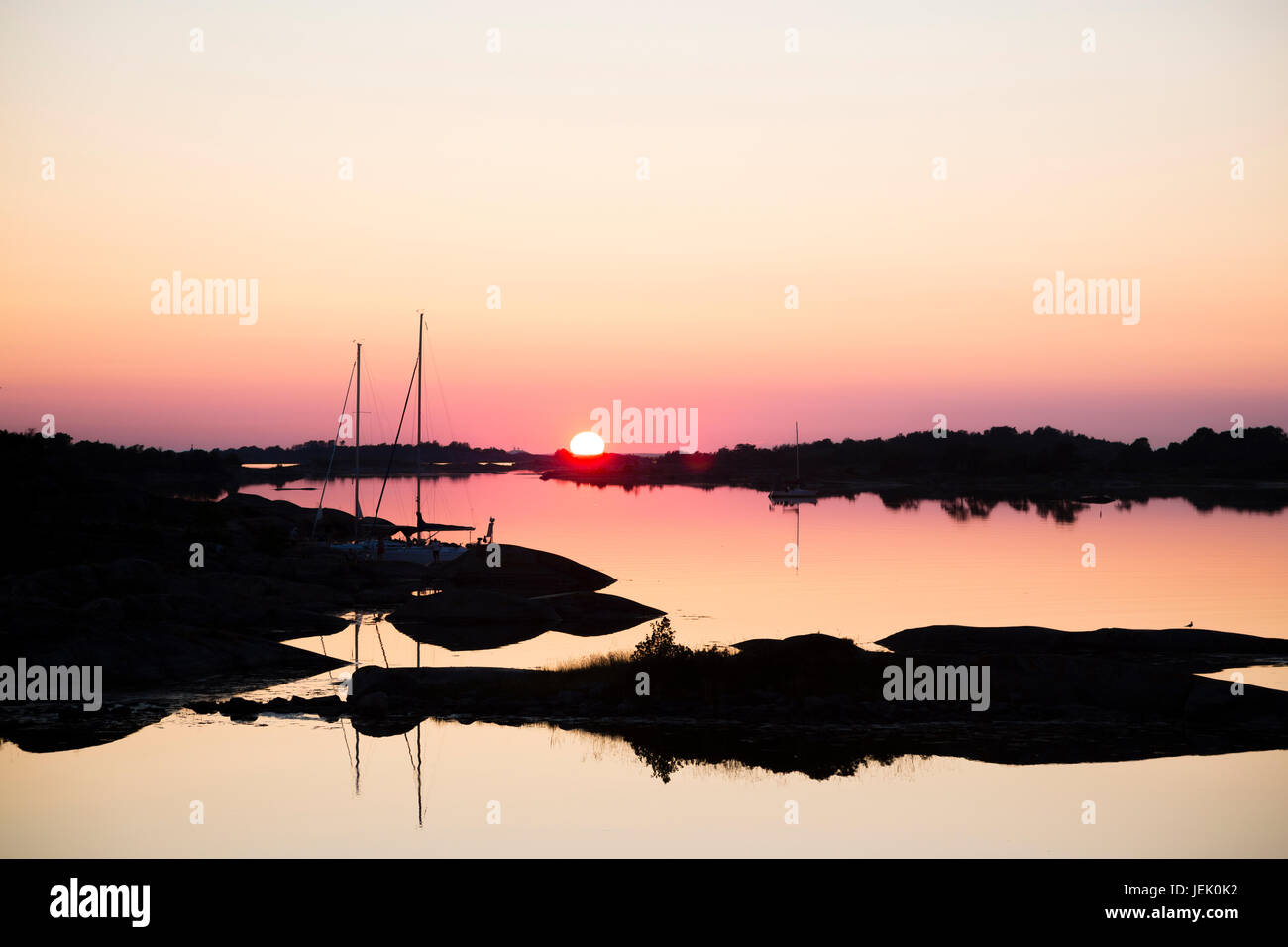 Sea coast at sunset Stock Photo - Alamy