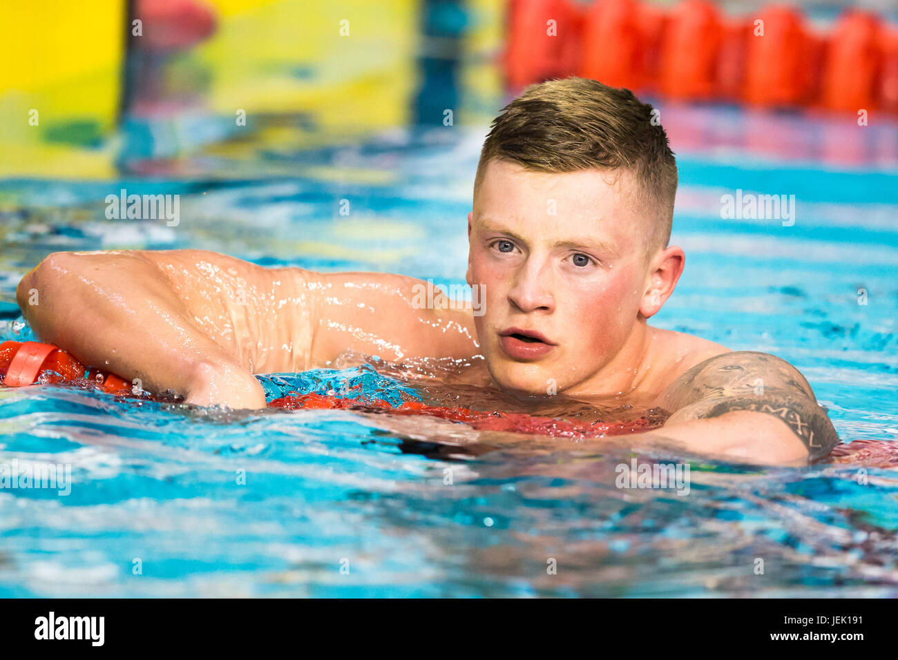 Adam Peaty catches his breath after competing in the British Swimming Championships at Ponds Forge, Sheffield on April, 18, 2017. Stock Photo