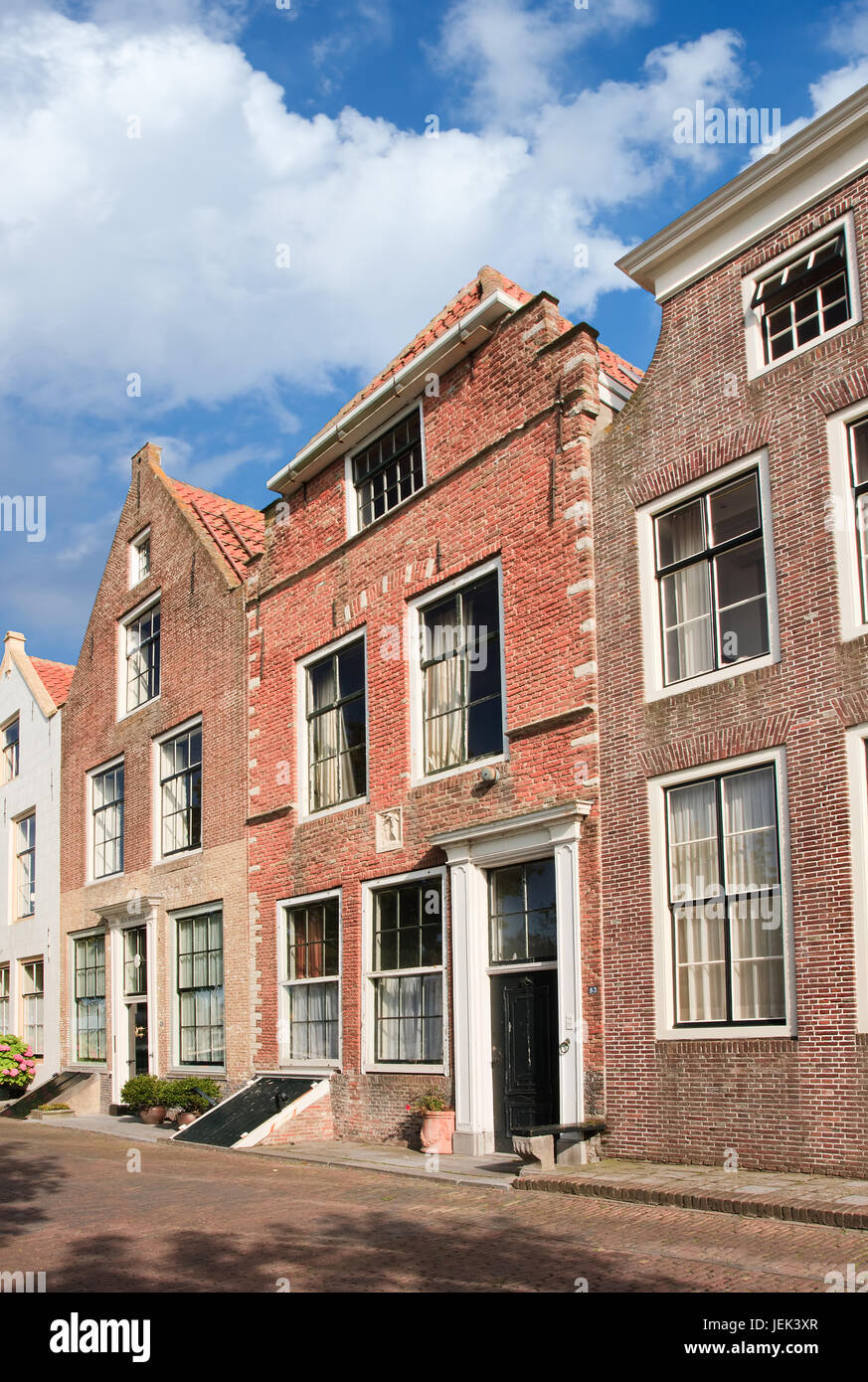 Street with row of ancient brickwork mansions, Veere, Netherlands Stock Photo