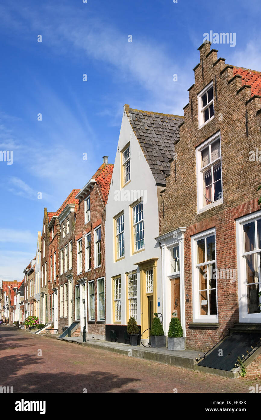 Street with row of ancient brickwork mansions, Veere, Netherlands Stock Photo