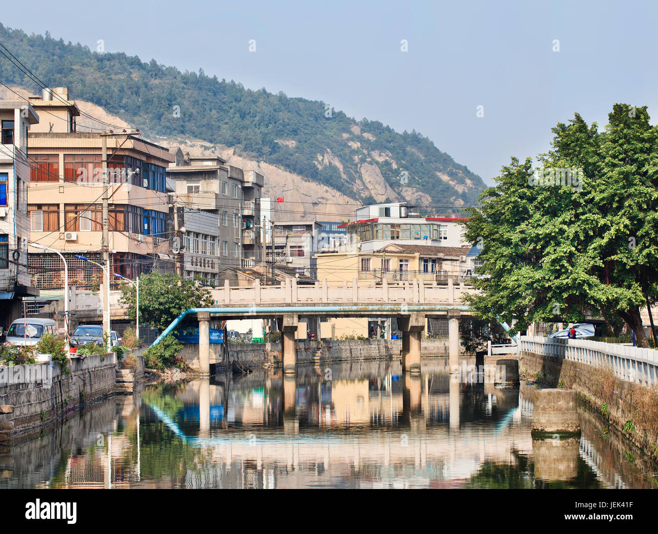 Waterway with bridge in old traditional neighborhood, Wenzhou, Zhejiang Province, China Stock Photo