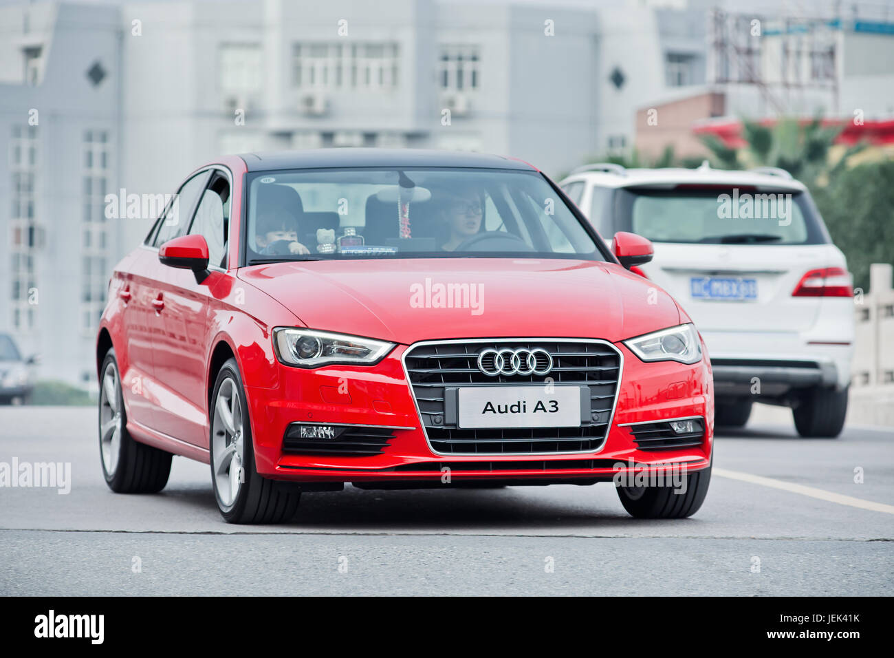WENZHOU-CHINA-NOV. 17, 2014. New Audi A3 on the street. German Audi, BMW and Mercedes-Benz maintain a solid grip on China’s luxury car market. Stock Photo