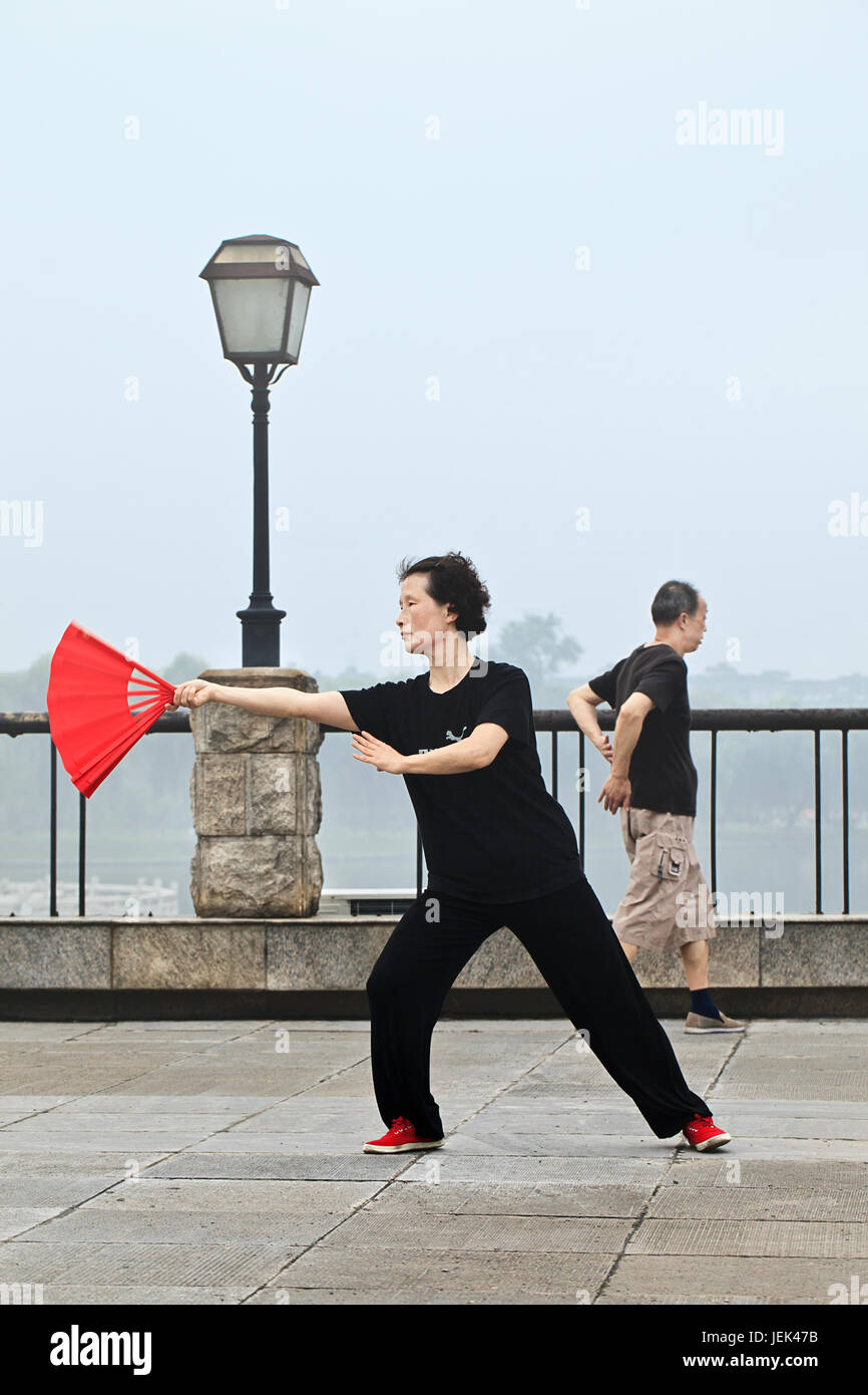 XIANG YANGCHINAJULY 4, 2012. Woman practice Tai Chi on July 4, 2012
