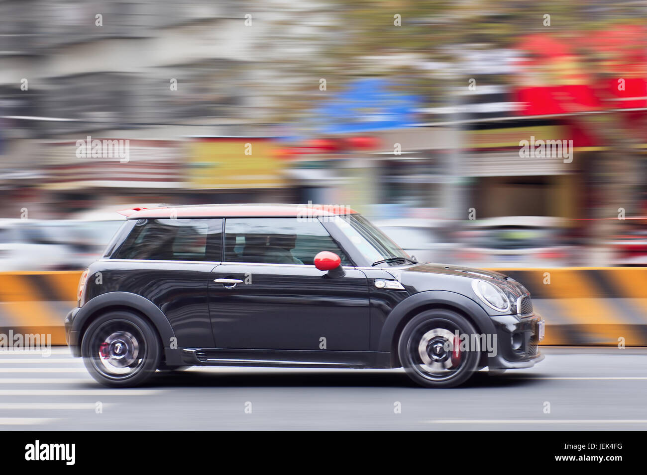 YIWU-CHINA-JAN. 2016. Black Mini Cooper. Despite Mini sales rose 17.8% in 2015, BMW face a drop in China as luxury products are hit by economic woes. Stock Photo