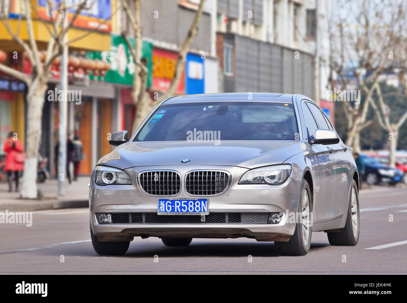 BMW 5 series on the road. BMW sales will be hit in 2016 by cut-throat competition, slowing Chinese economy and crackdown on conspicuous consumption. Stock Photo