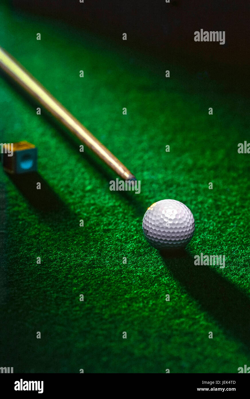 Billiards cues with golf ball, india, asia Stock Photo Alamy