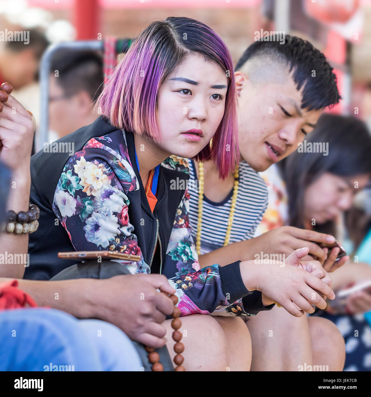 BEIJING-MAY 29, 2016. Portrait of fashionable young girl. International fashion retailers targeting Chinese youth because they are the future spenders. Stock Photo